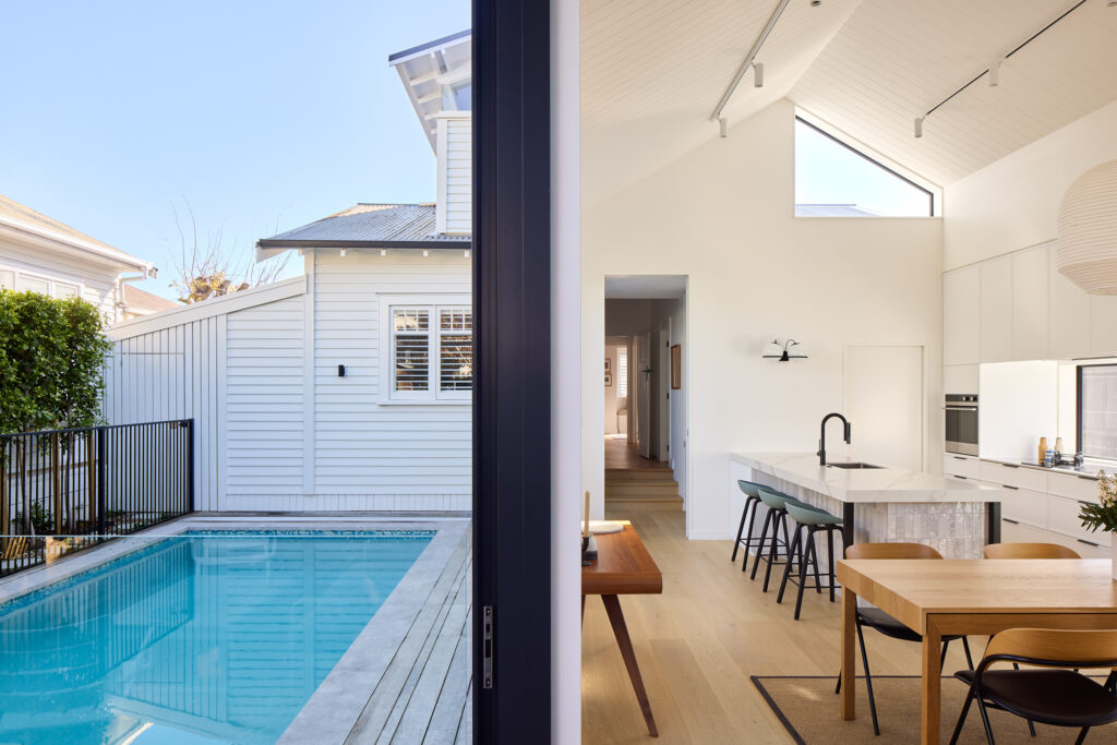 Swimming pool catches afternoon sunlight, Westmere bungalow renovation