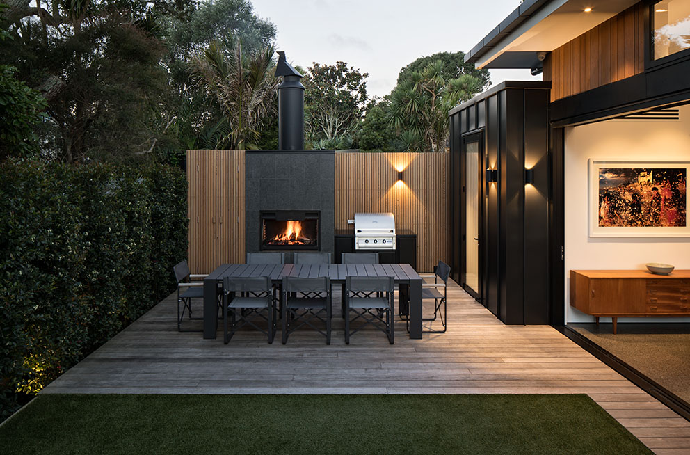 Sheltered terrace with outdoor fireplace, Grey Lynn garden