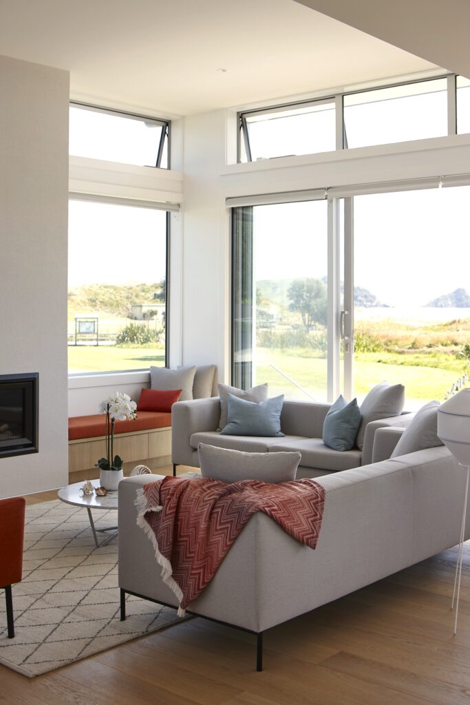 Double-height living with beach views, Opito Bay