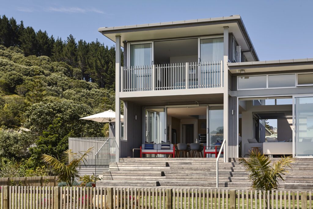 Cedar clad beachfront holiday home, Opito Bay