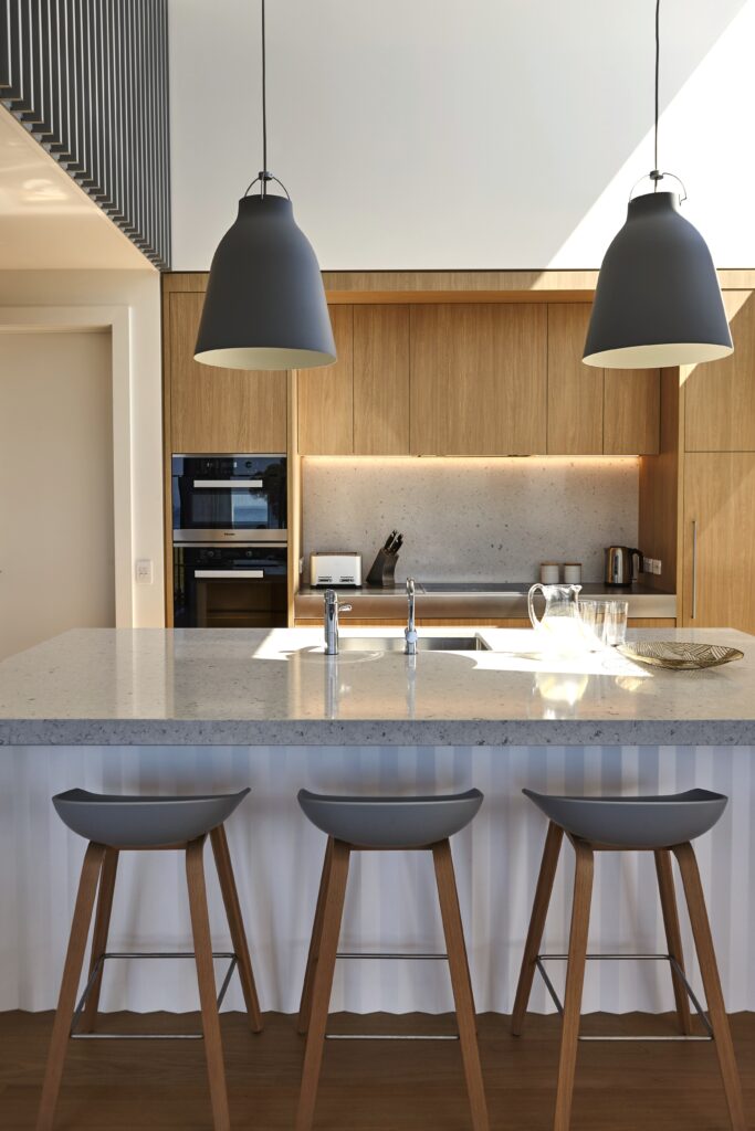 Double height oak and white kitchen, beach house