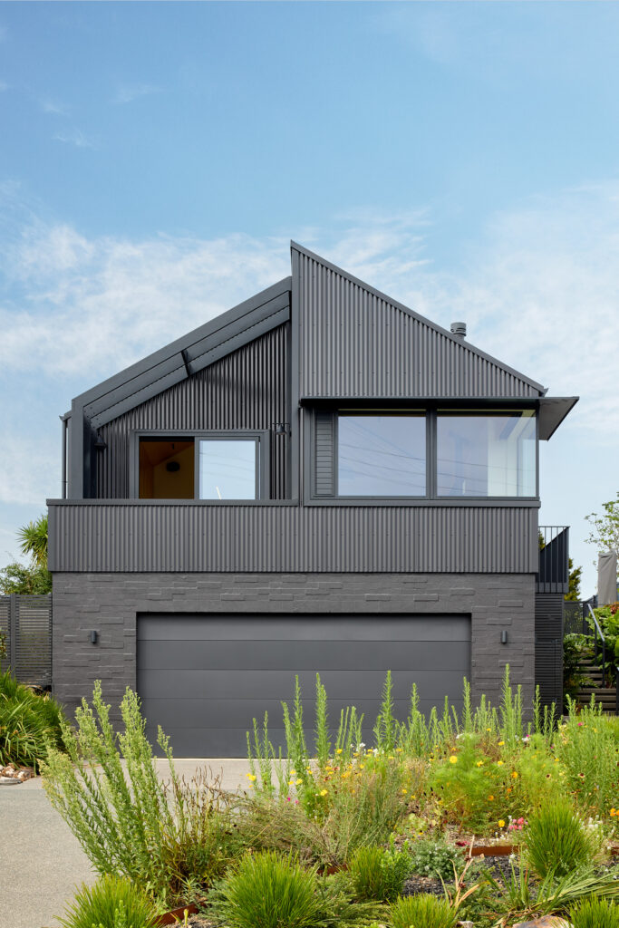 Rogan Nash Architects Waiheke new house with black metal cladding